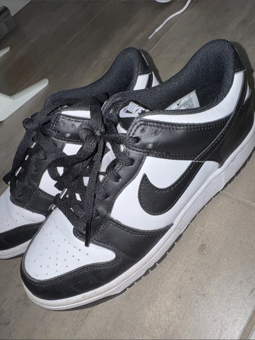 Nike women's Black and White dunk sneakers